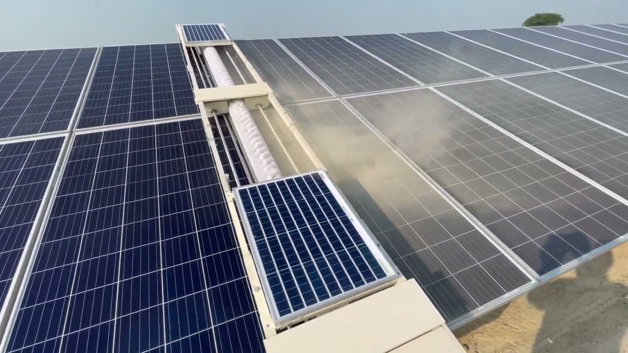 Dry-based robotic solar panel cleaning installation at utility-scale solar power plant